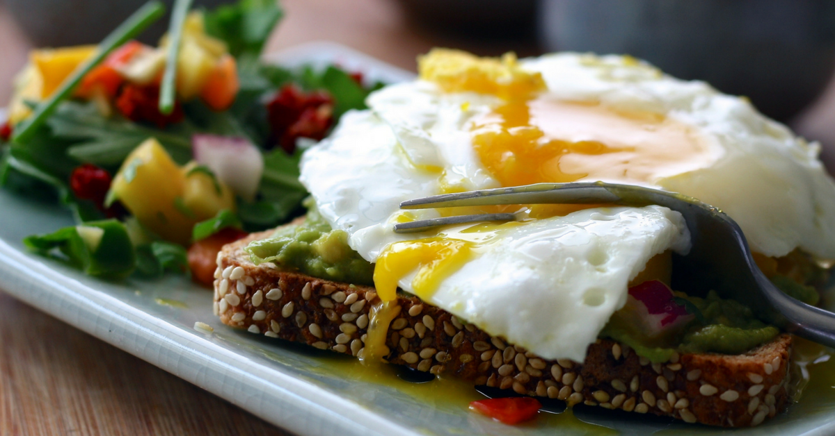 Breakfast-runny-egg-on-toast-with-side-salad