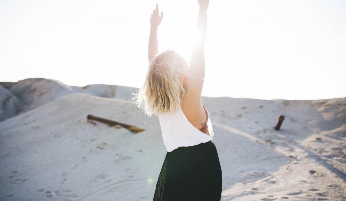 happy-women-at-beach-sand