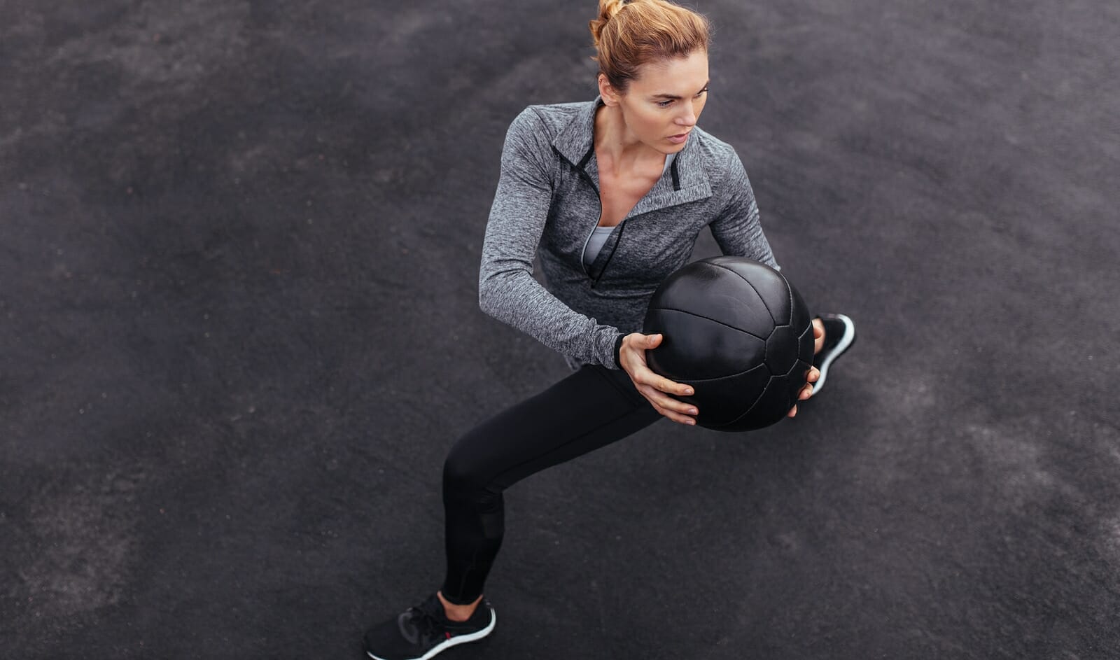 bigstock-Fit-Woman-Exercising-Outdoors-204024133