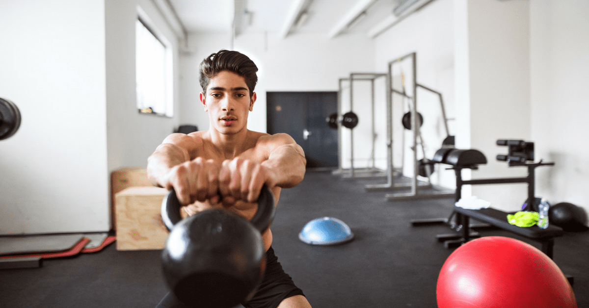 guy-performing-kettlebell-swings